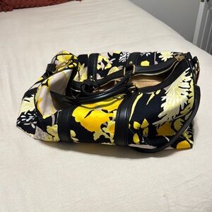 Louis Vuitton Black and Yellow Travel Bags with Dynamic Pattern